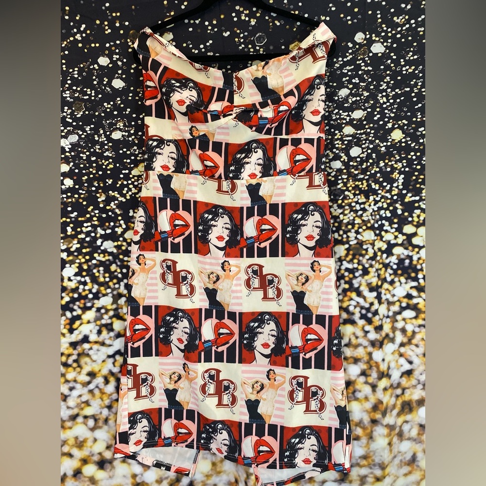 Off the shoulders, comic strip dress